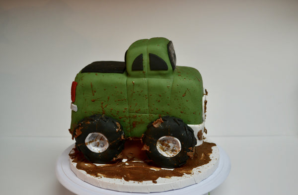 Chocolate pickup truck shaped cake covered with fondant and 100% edible by Sugar Street Boutique Toronto