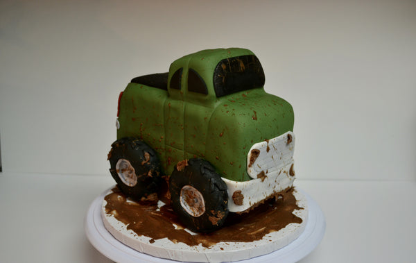 Chocolate pickup truck shaped cake covered with fondant and 100% edible by Sugar Street Boutique Toronto