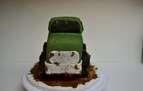 Chocolate pickup truck shaped cake covered with fondant and 100% edible by Sugar Street Boutique Toronto