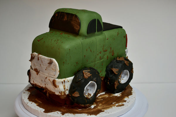 Chocolate pickup truck shaped cake covered with fondant and 100% edible by Sugar Street Boutique Toronto