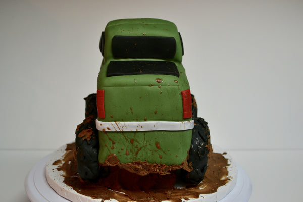 Chocolate pickup truck shaped cake covered with fondant and 100% edible by Sugar Street Boutique Toronto